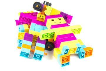 Toy colorful plastic blocks isolated on white background   © sakdinon