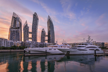 Modern architecture and large yachts in Singapore.