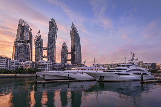 Modern architecture and large yachts in Singapore.
