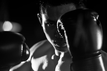 Boxing man ready to fight. black and white