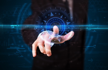 Handsome tech guy pressing high technology control panel screen