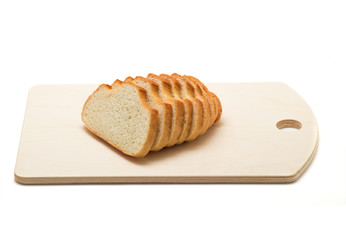 Sliced loaf on a wooden chopping board