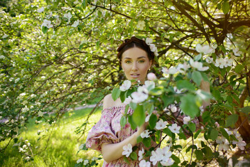 Young beautiful woman in the garden