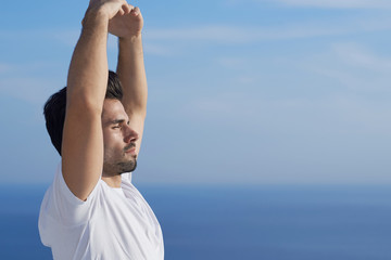 young man practicing yoga