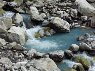 Naklejka na ściany i meble Blue creek comming from Ngozumba Glacier