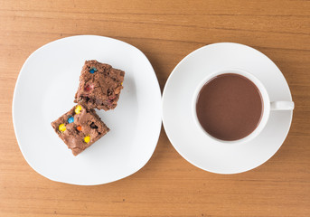 a cup of chocolate with brownie
