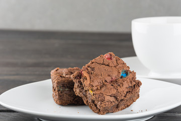 brownies in plate on wood table