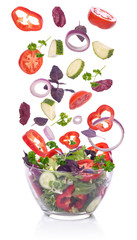 Salad and vegetables for the salad incident isolated on white ba