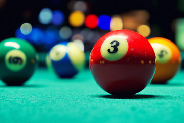 Billiard balls in pool hall