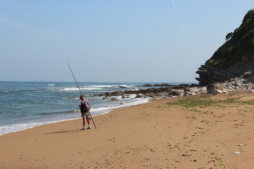 Pêcheur sur la plage