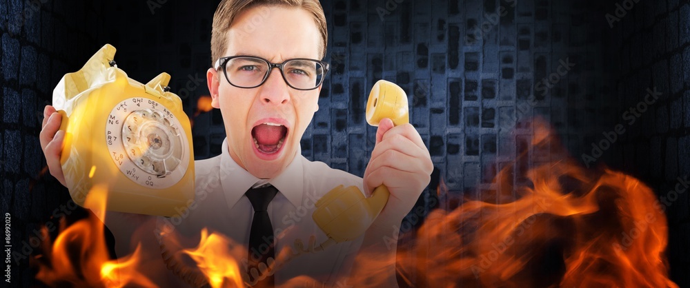Poster composite image of geeky businessman shouting at retro phone