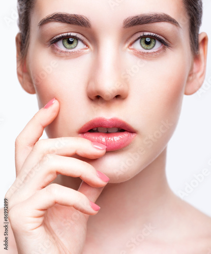 "Young beautiful woman with day makeup and green pistachio colou