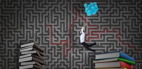 Composite image of businessman flying with balloons © vectorfusionart