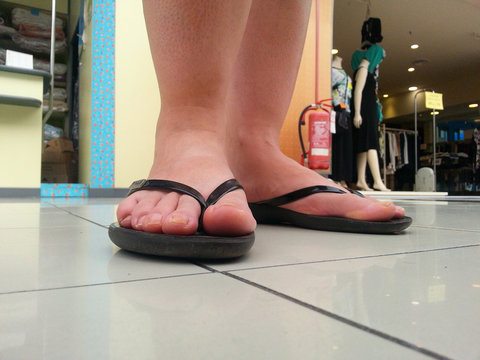 Woman feet shopping