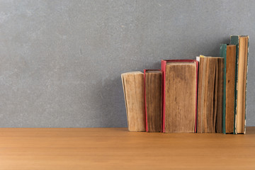 stack of books on wood table