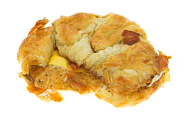 Bacon egg and cheese croissant breakfast sandwich side view