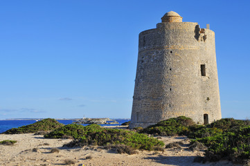Fototapeta na wymiar Torre de Ses Portes tower in Ibiza Island, Spain