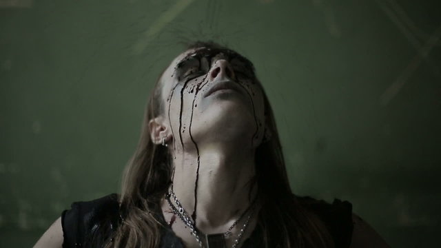 Pagan prayers and bloodshed on his head. Slow motion