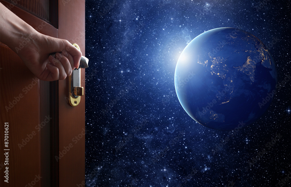 Canvas Prints room with open door.planet earth from the space. some elements of this image furnished by nasa
