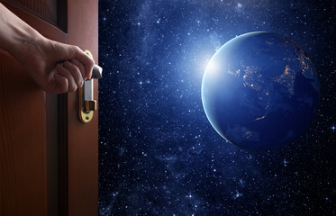 room with open door.Planet earth from the space. Some elements of this image furnished by NASA