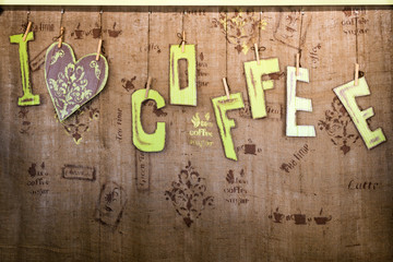 i love coffee words on natural burlap texture. Handmade sign board for cafe or restaurant with free space for your text.