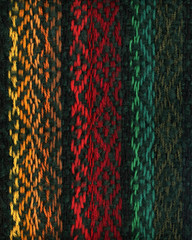 Hand-woven fabric in three colors, yellow, red and green
