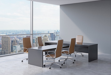 Modern office interior with huge windows and New York panoramic view. Brown leather on the chairs...