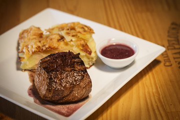 beef steak with potato and cheese bake