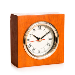 Old alarm clock on a white background