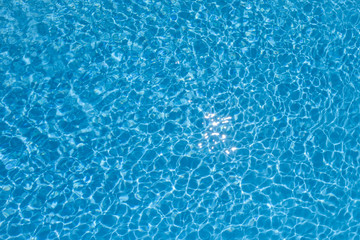 Fototapeta na wymiar Blue water surface and textured
