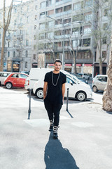 Young italian boy walking in the city