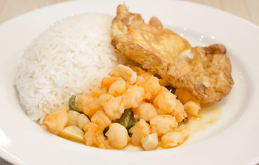 stir-fried prawn with chili sauce on rice and fried egg
