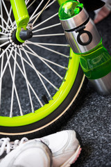 Naklejka premium Bike weel, bottle and sport shoes 
