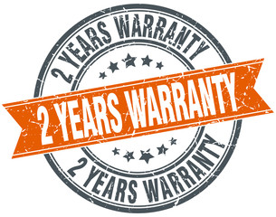 2 years warranty round orange grungy vintage isolated stamp