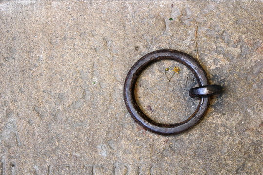 metal ring on tomb