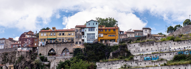 Coast of the River Douro with its beautiful architecture in Porto, Portugal. View from the River Douro, one of the major rivers of the Iberian Peninsula (2157 m)