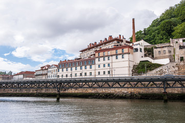 Beautiful houses on the coast of the River Douro in Porto, Portugal. View from the River Douro, one of the major rivers of the Iberian Peninsula (2157 m)