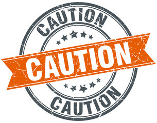 caution round orange grungy vintage isolated stamp