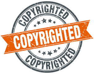 copyrighted round orange grungy vintage isolated stamp