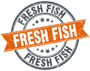 fresh fish round orange grungy vintage isolated stamp