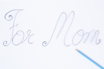 Color pencils to write words for mom.