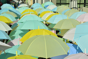 Street decorated with colored umbrellas.