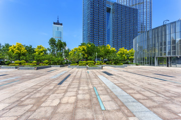 Modern skyline and empty road floor