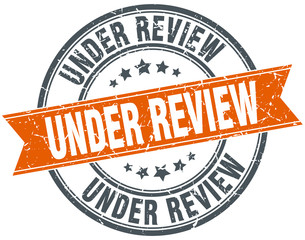 under review round orange grungy vintage isolated stamp