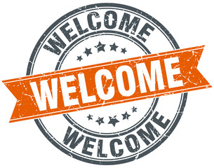 welcome round orange grungy vintage isolated stamp