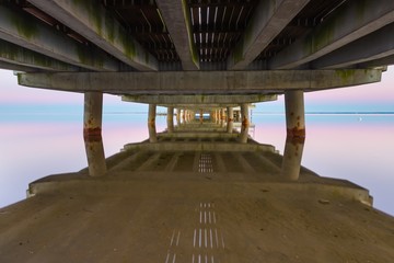 Beautiful wooden pier on Baltic sea shore