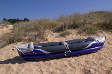 Two person inflatable kayak on beach