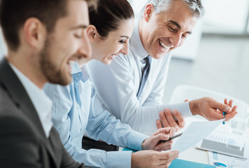 Business team discussing on paperwork