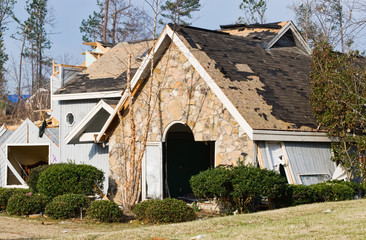 Tornado destroyed wood and stone exterior residential house