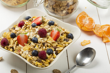 Light, delicious breakfast with cereal and fruit.